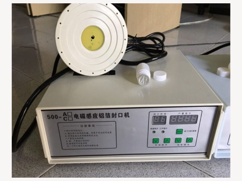 Máy dán màng nhôm hũ nhựa 500c (7) (1)